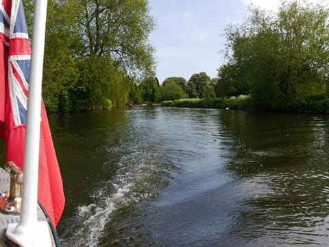 Soft ripples and reflected light on the River Avon.